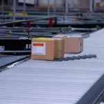 Sliding shoe sortation conveyor, Parts Town