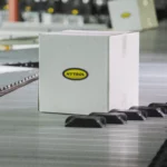 Sliding shoe sortation conveyor, Hytrol stock image